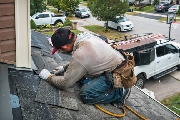 Professional Roofing technician working in North Henderson, IL